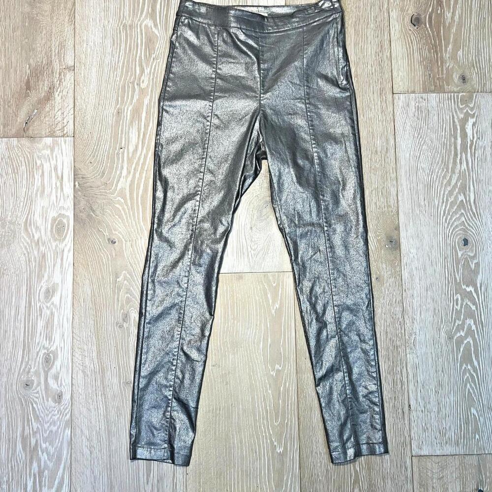 The product is a pair of H&M skinny jeans for women in size 12, featuring a side